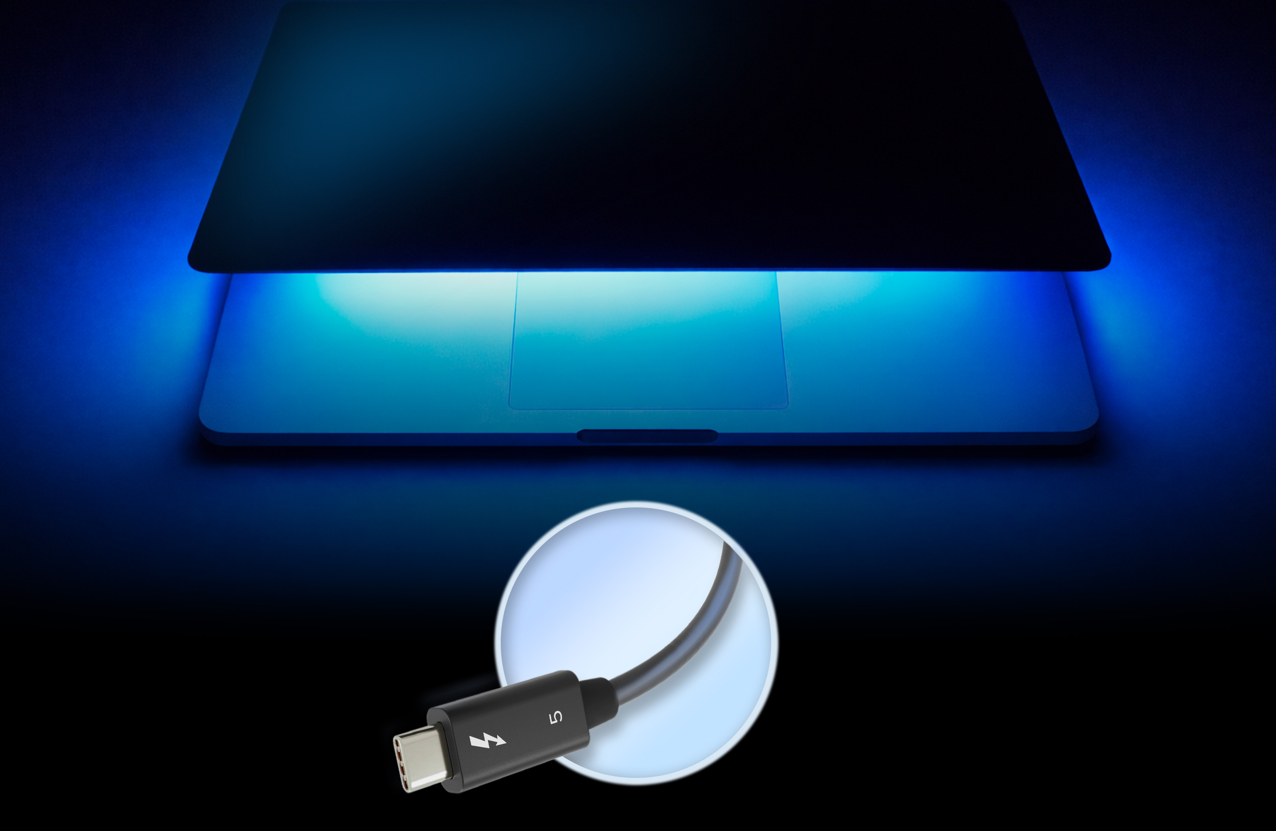 MacBook Pro with Thunderbolt 5 cable.