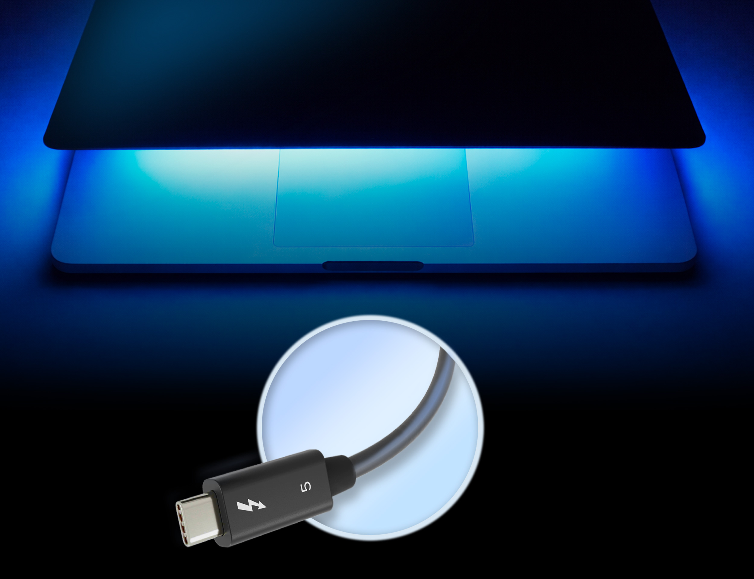 MacBook Pro with Thunderbolt 5 cable.