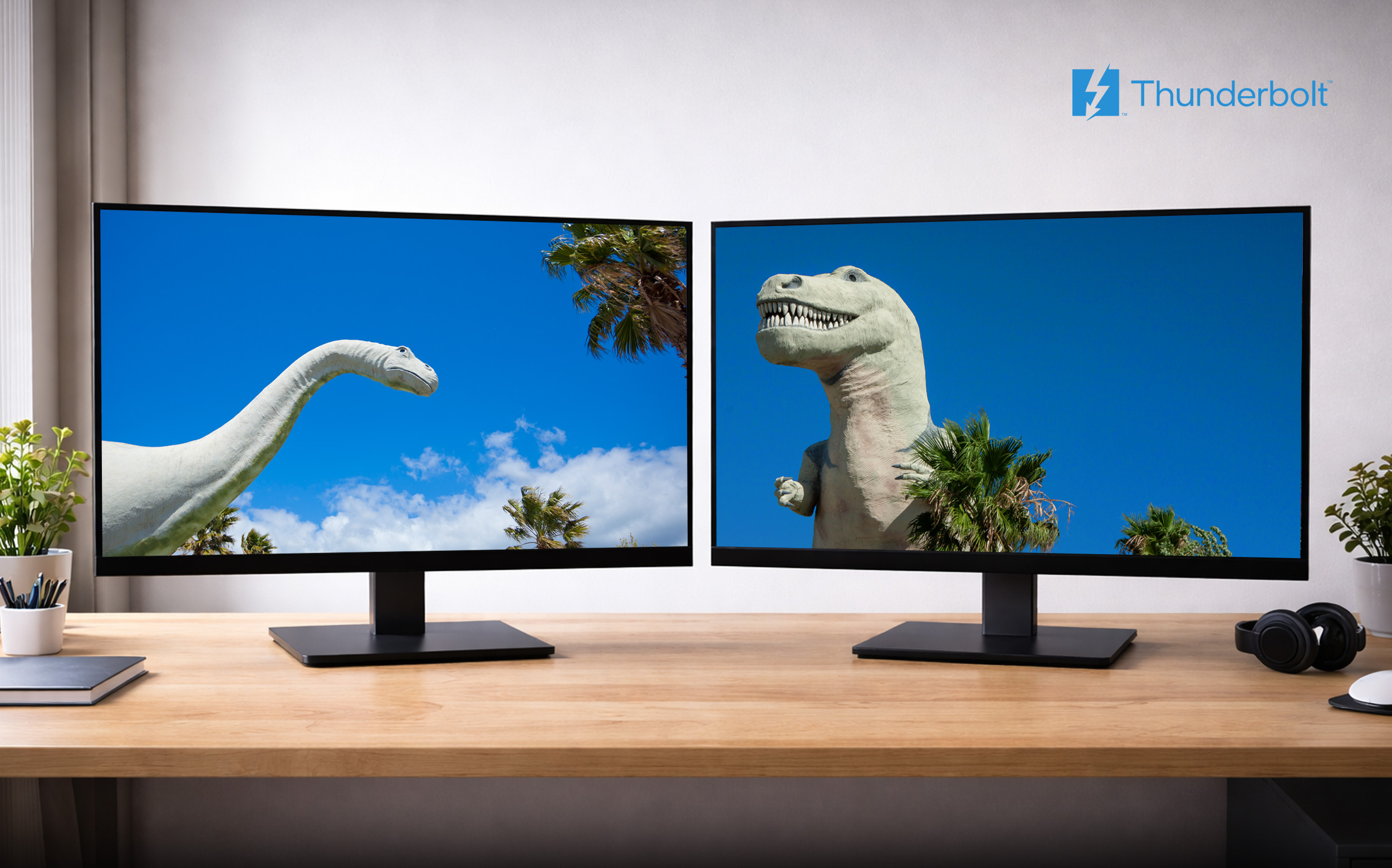 Two 4K displays sitting on a desk.