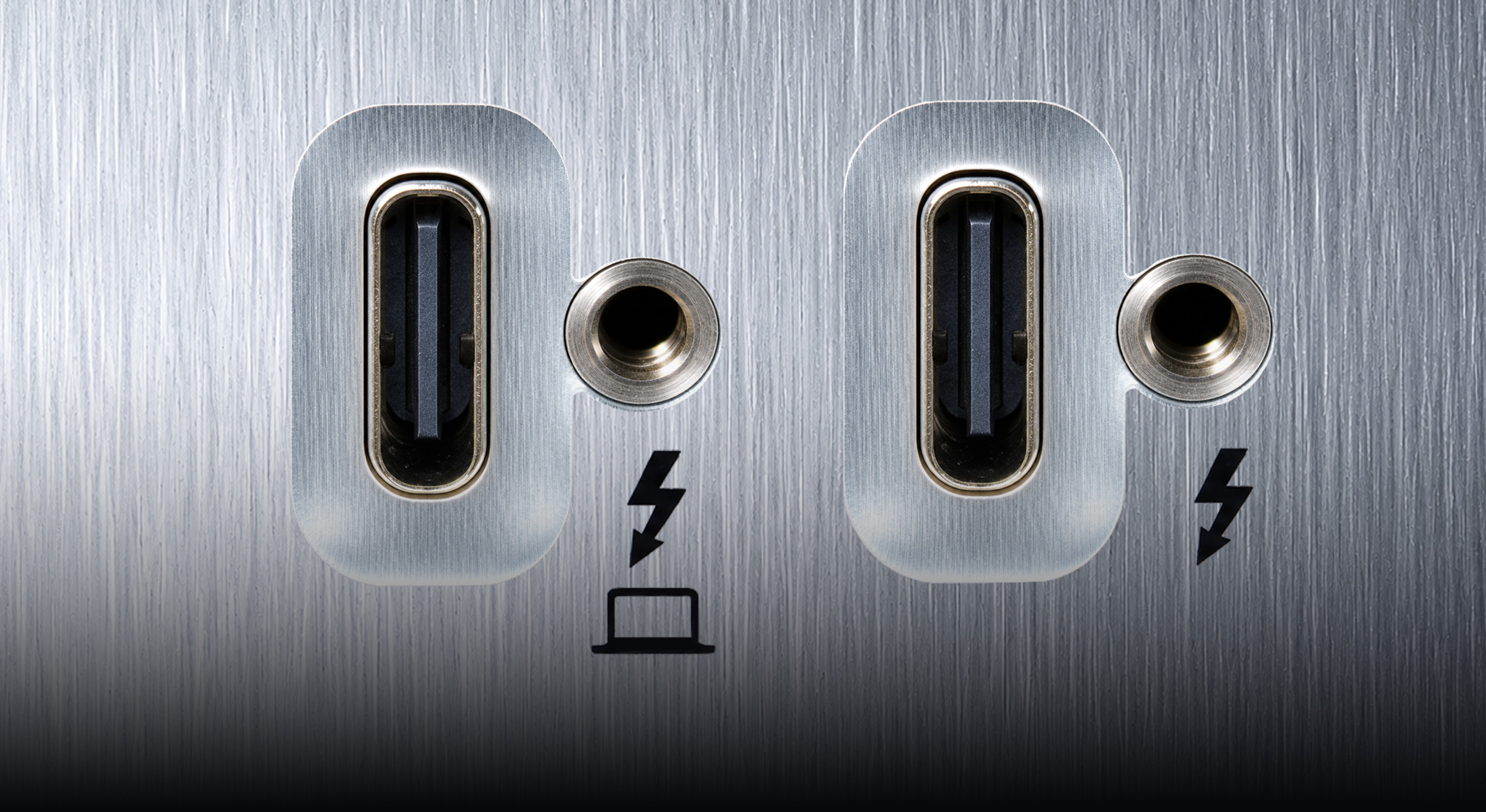 Close up of Thunderbolt computer host port and second Thunderbolt port.
