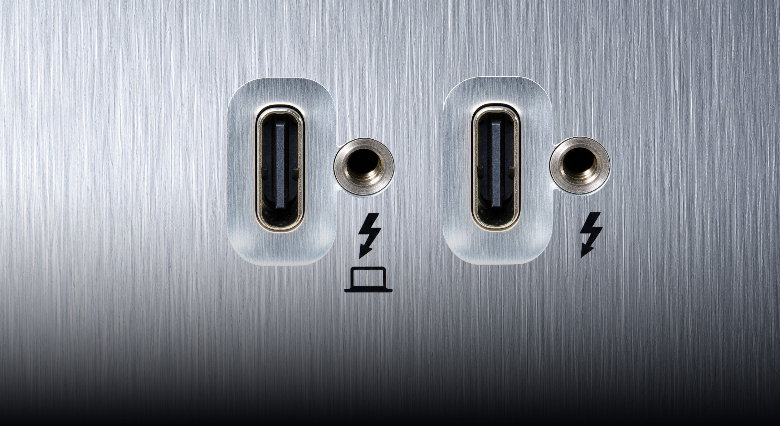 Close up of Thunderbolt computer host port and second Thunderbolt port.