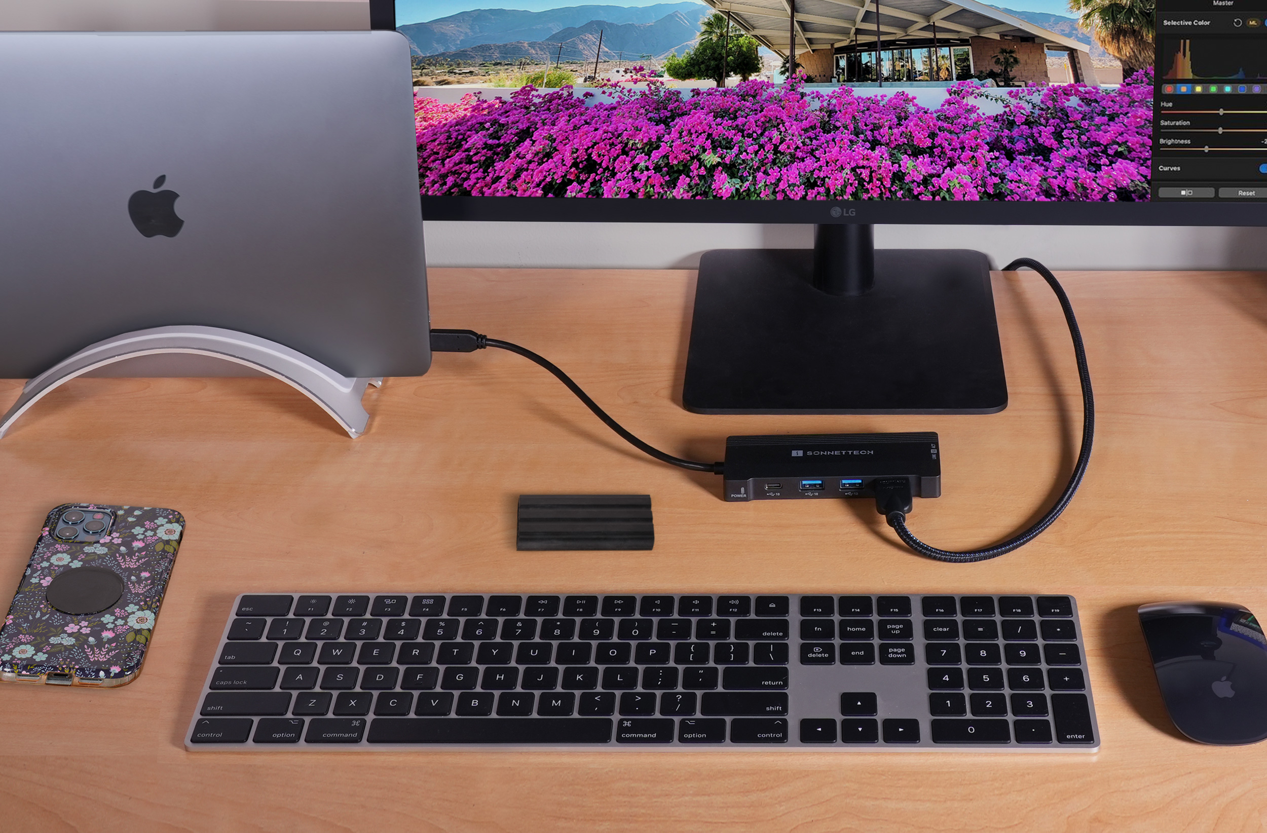 Computer desk with Echo 6 connected to MacBook Pro and 4K monitor.