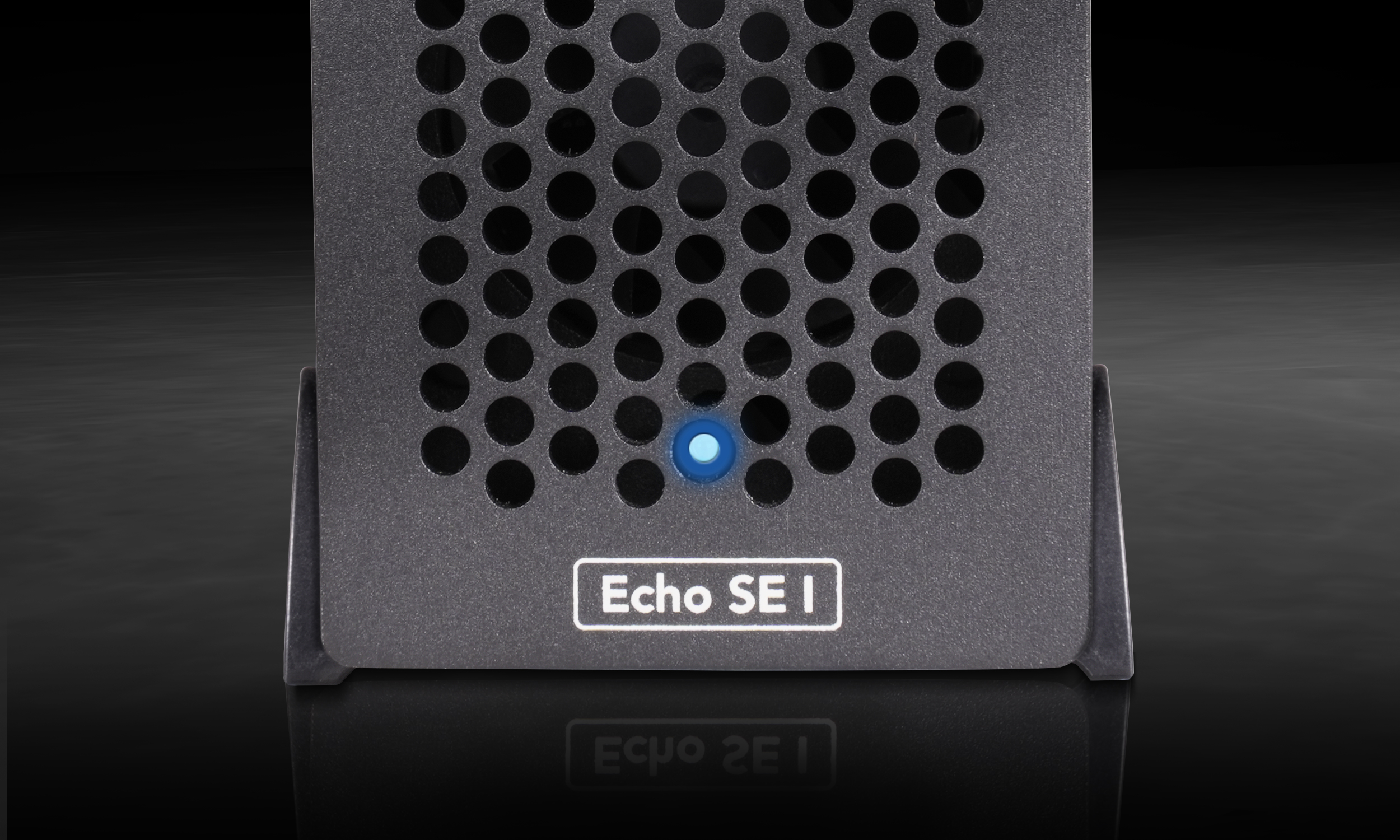 Close up front view of lower area of Echo SE I T5, showing the power light on.