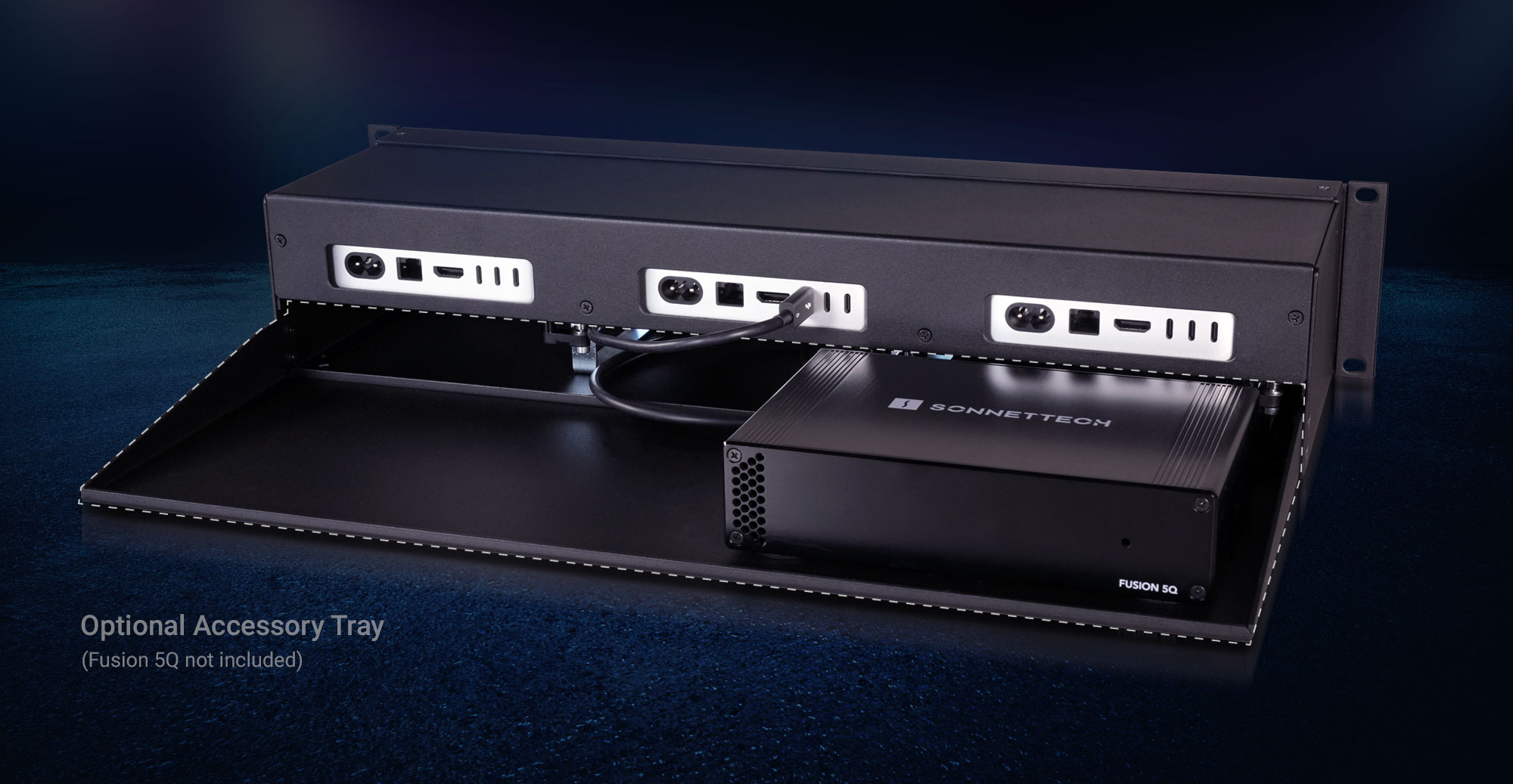 RackMac mini (2024+) enclosure in mobile rack kit with audio mixing board and concert stage in the background.