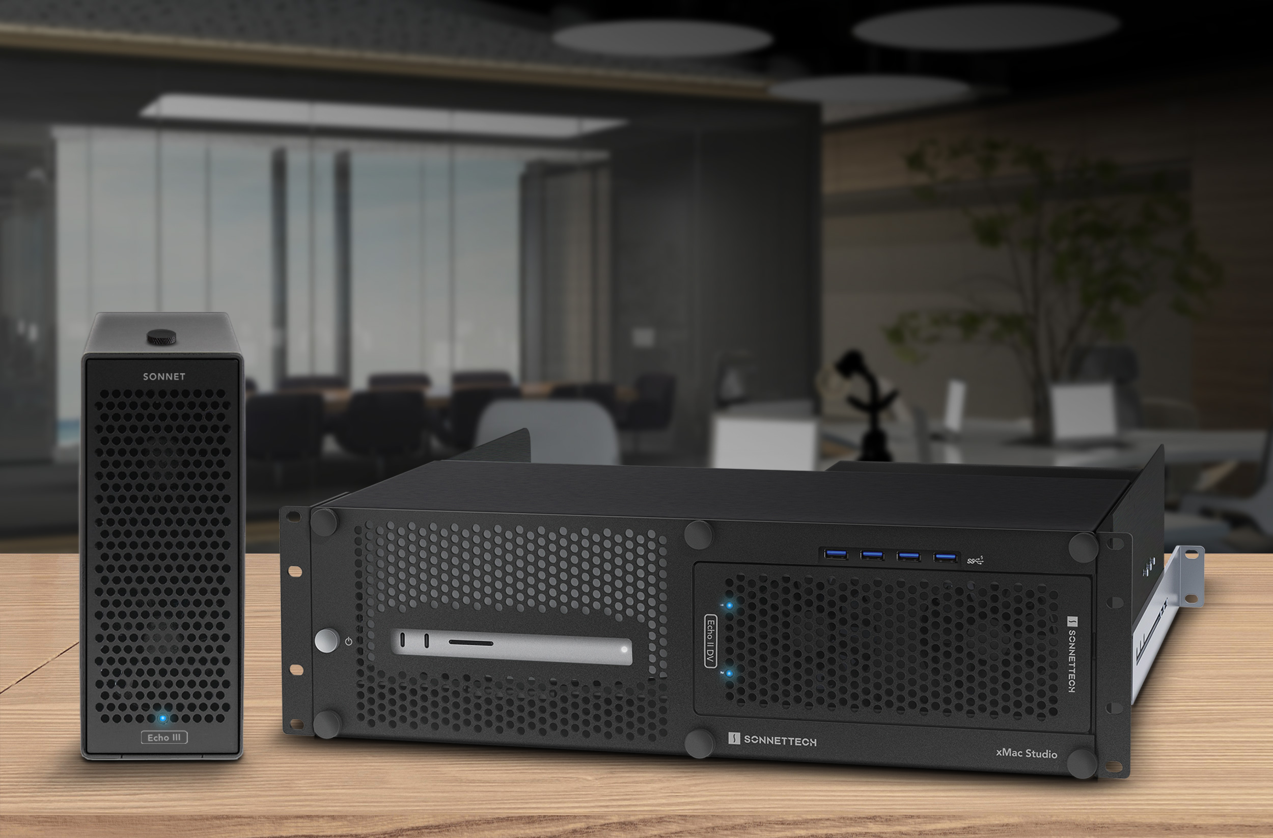 Lifestyle shot showing Echo III Thunderbolt Expansion System sitting next to a xMac Studio Expanion System.