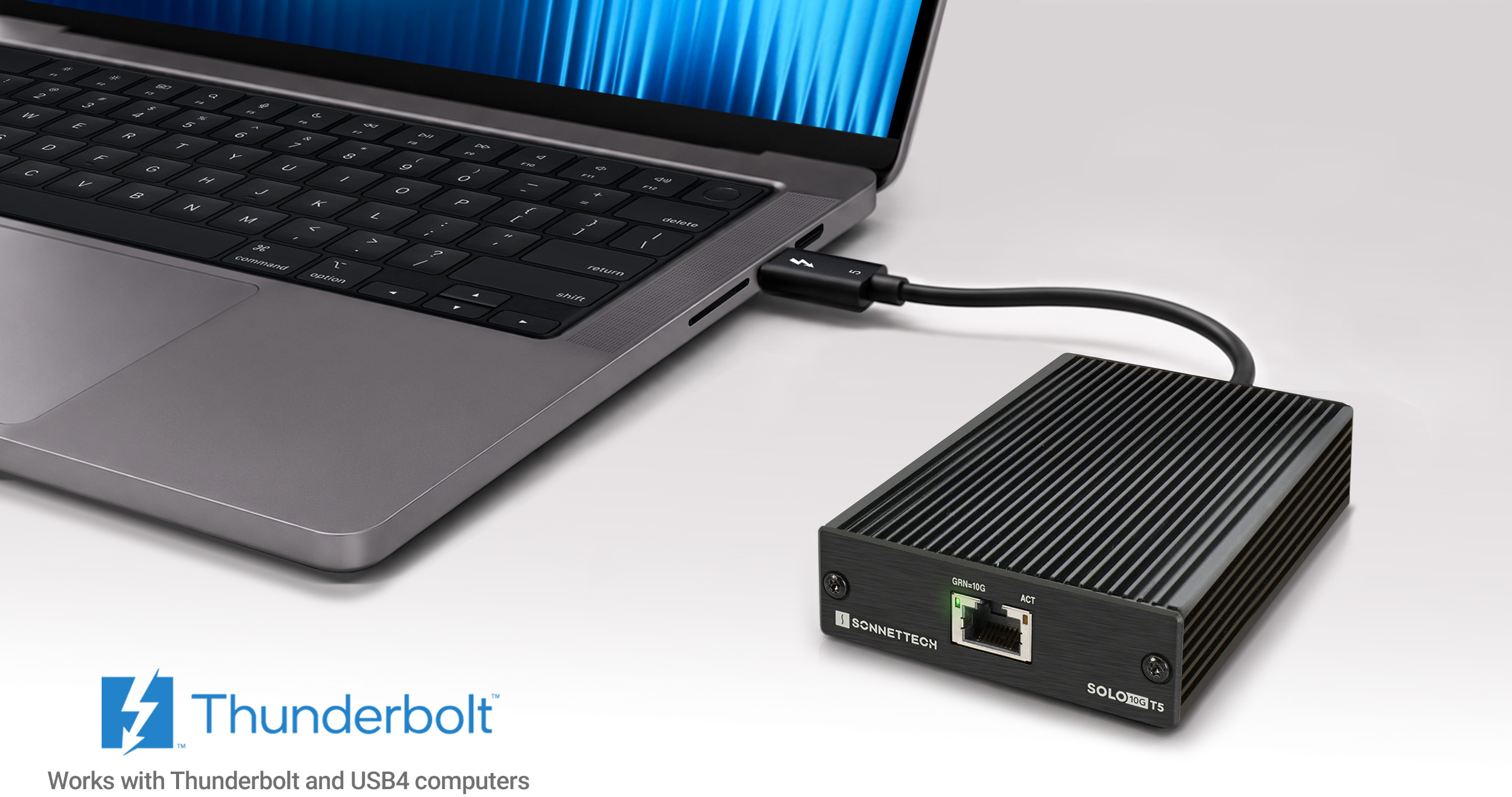 Solo10G T5 Thunderbolt 5 Adapter connected to MacBook Pro.