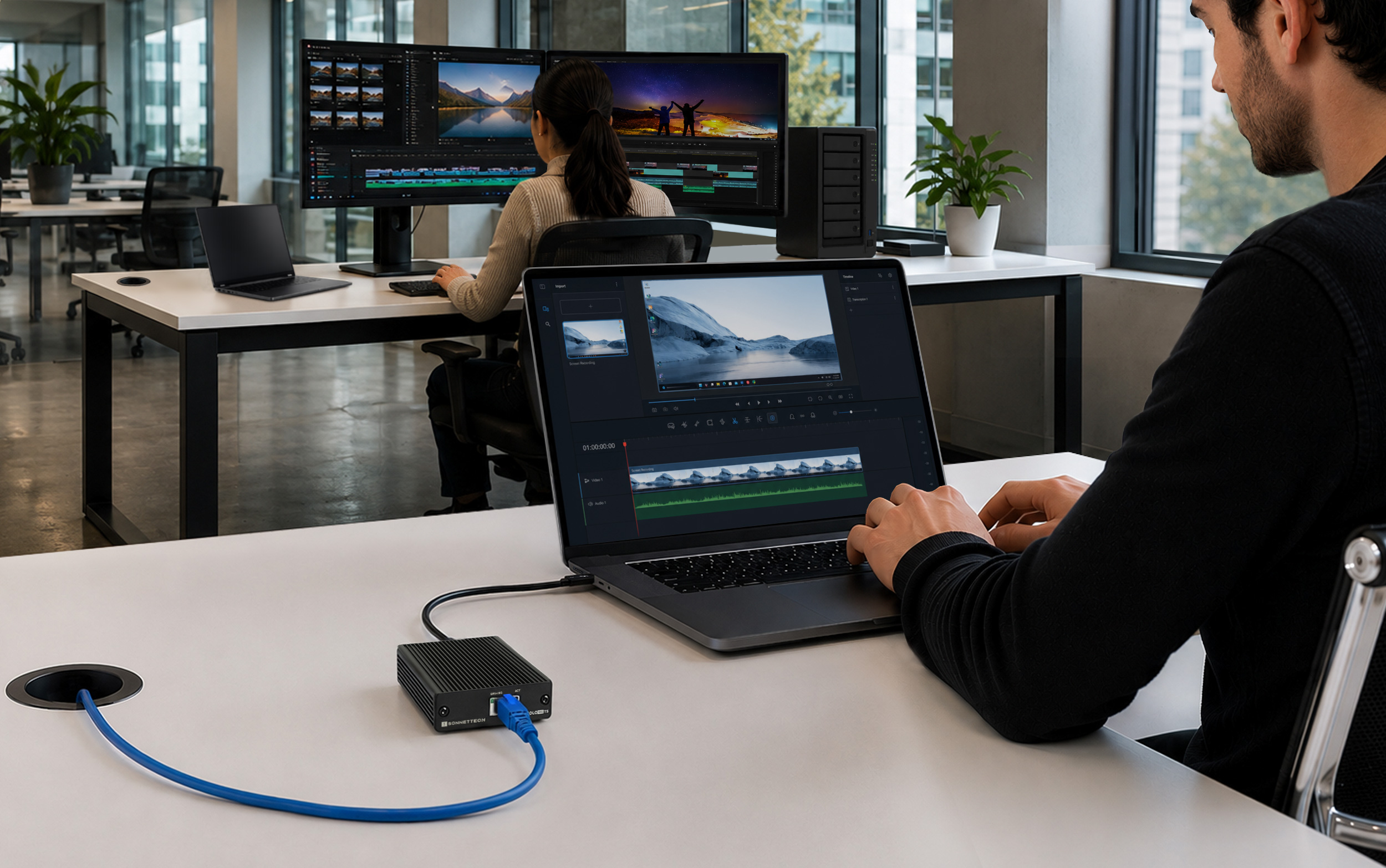 Video production studio with editors working on video production, with one workstation MacBook Pro connected to Solo10G T5 and an Ethernet cable.